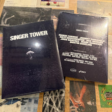 画像をギャラリービューアに読み込む, [Singer Tower] DVD by Tristan Mershon
